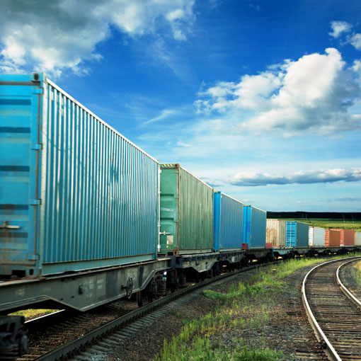 Train with rail cars loaded with containers 