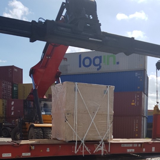 Cordlash 105 woven lashing securing crated goods on a flatrack container